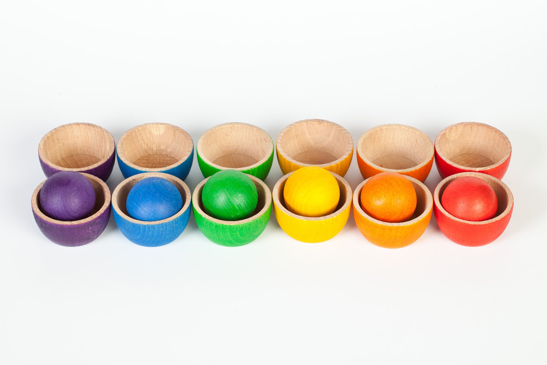 Colourful wooden toy bowls and balls for open ended play