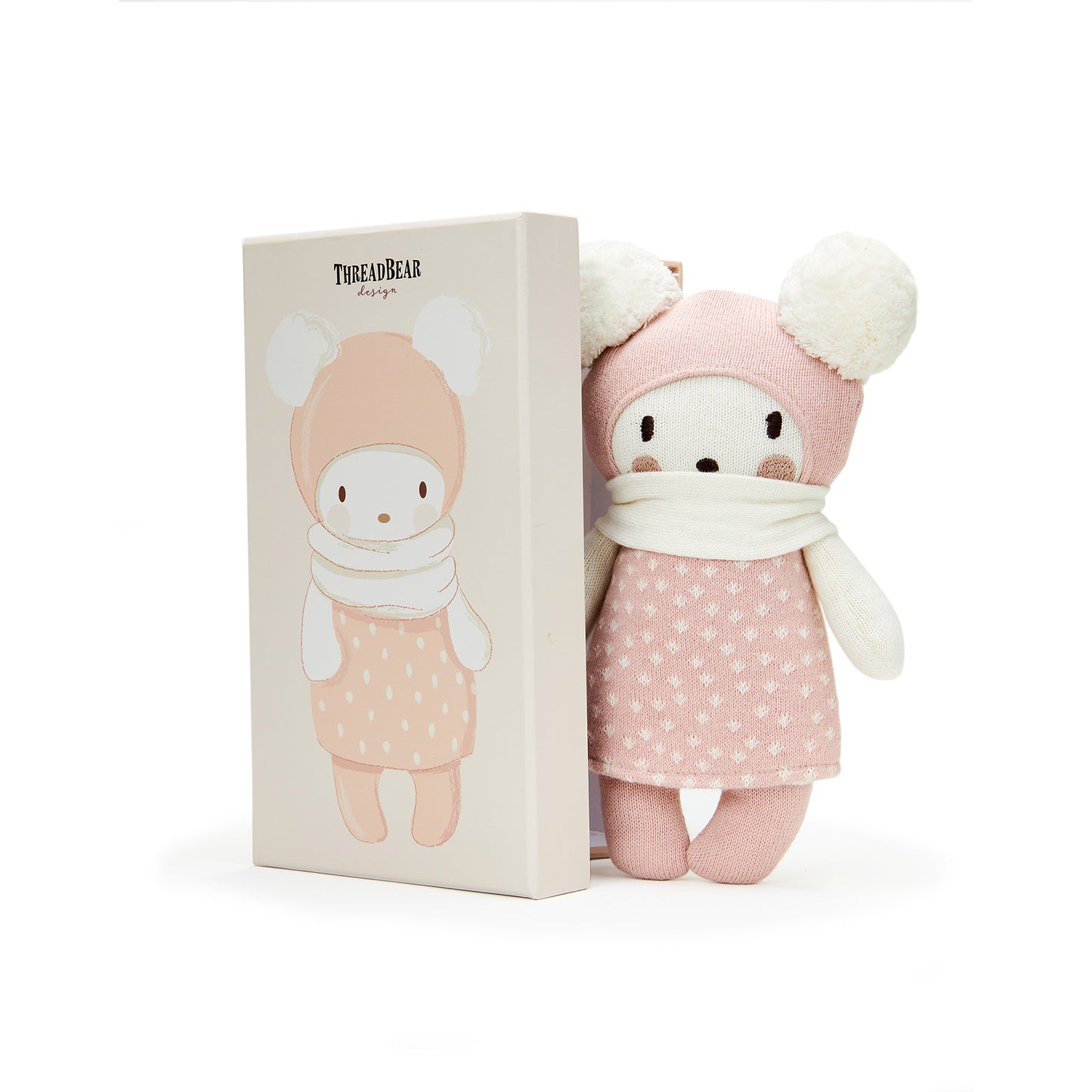 Baby Bella knitted soft toy doll. Made from soft knitted cotton and dressed in soft pink. Suitable from birth.