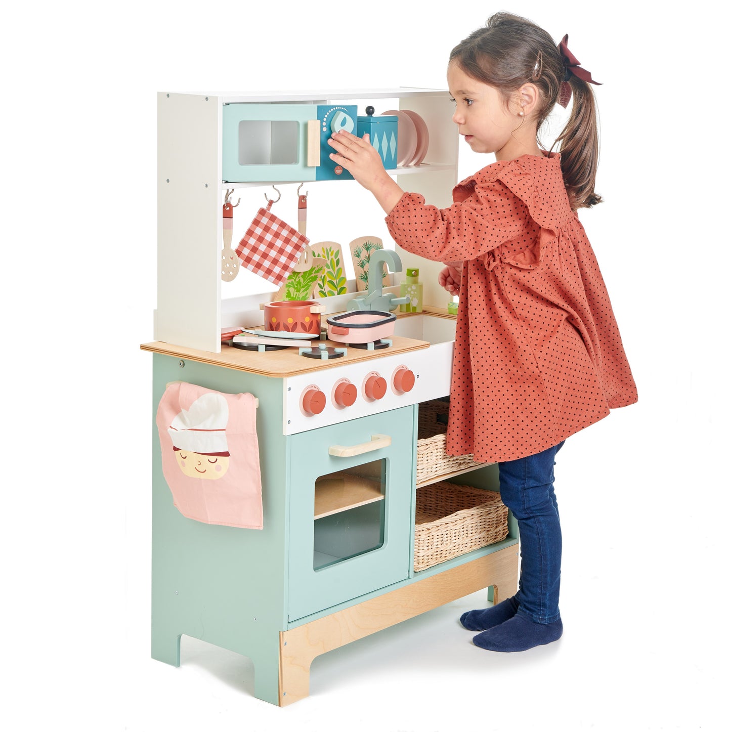 Tender Leaf Toys Kitchen Range showing side view with child looking a toy microwave.