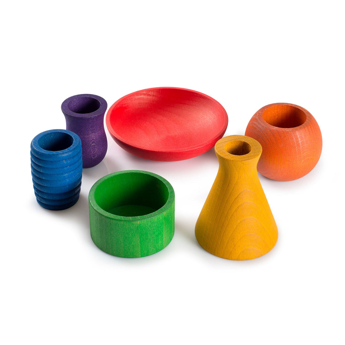 Set of colorful wooden pots on a white background