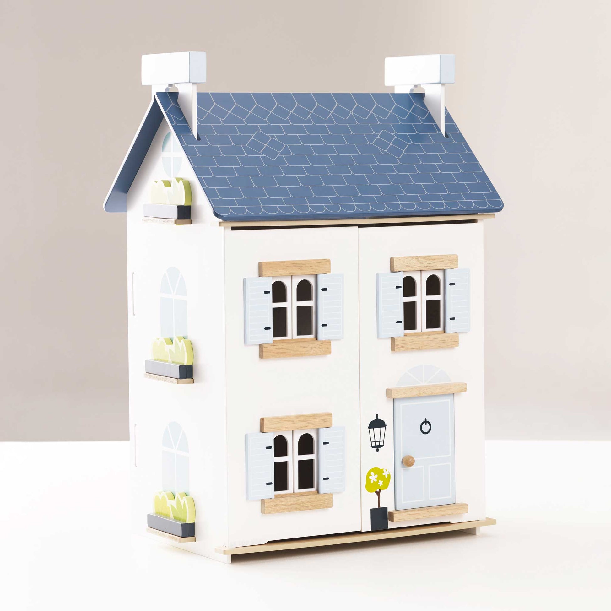Sky Dolls House, a beautifully crafted wooden dollhouse with multiple rooms from Froglet Toys
