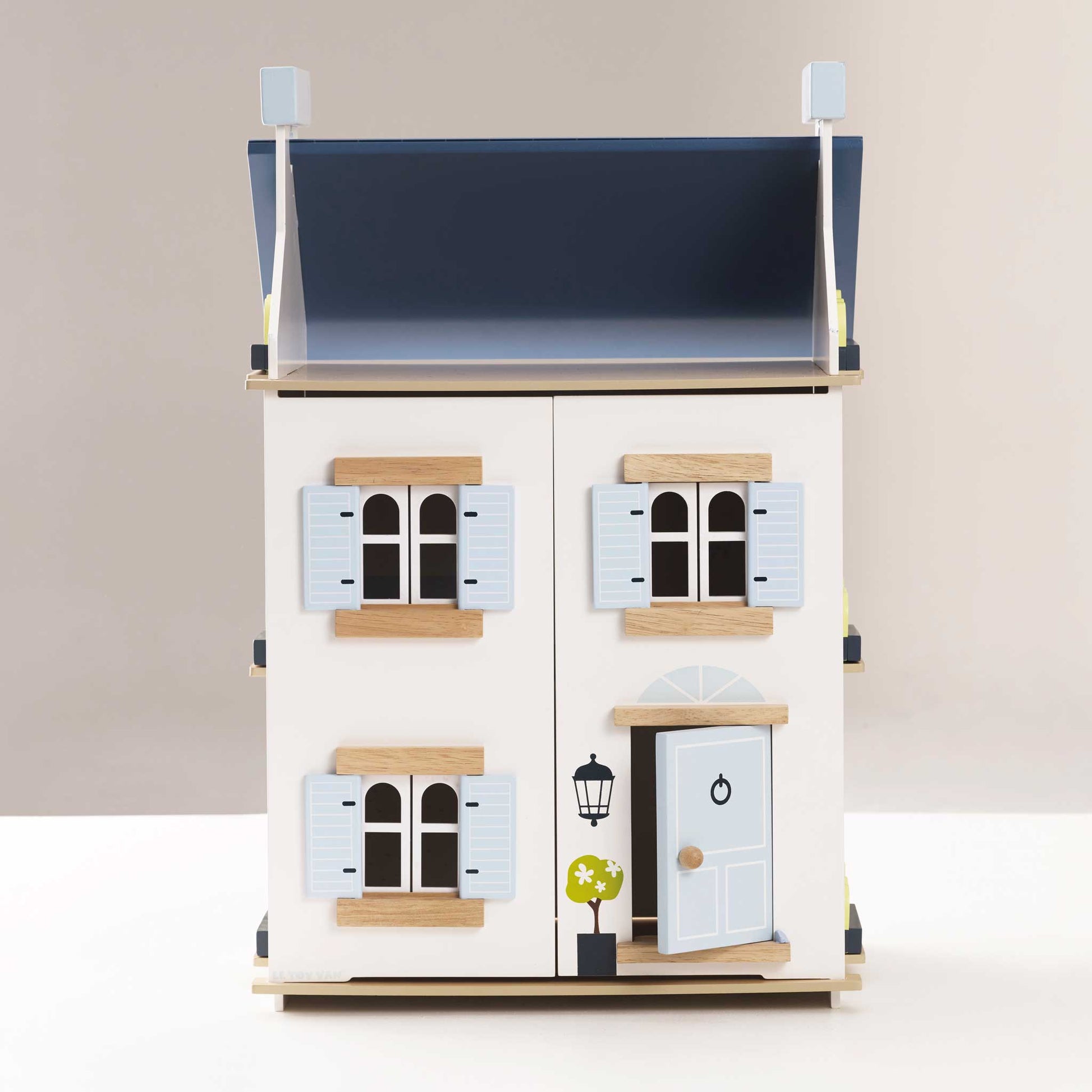 Sky Dolls House, a beautifully crafted wooden dollhouse with multiple rooms from Froglet Toys
