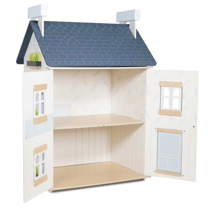 Sky Dolls House, a beautifully crafted wooden dollhouse with multiple rooms from Froglet Toys
