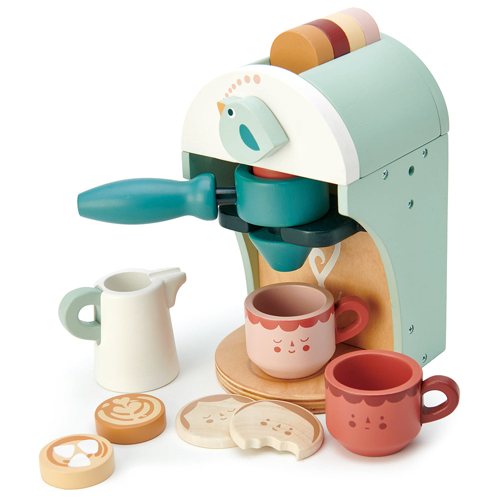 Wooden toy cappuccino maker showing coffee disks.