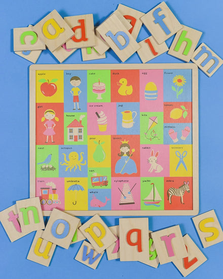 Video showing wooden alphabet toy.  Wooden letter pieces lift away to show images starting with the same letter.  