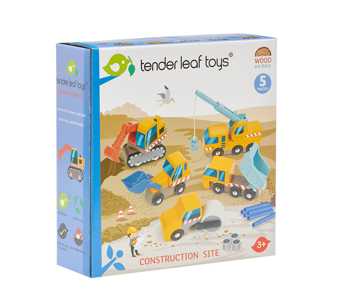 Box containing a set of five wooden toy construction vehicles.